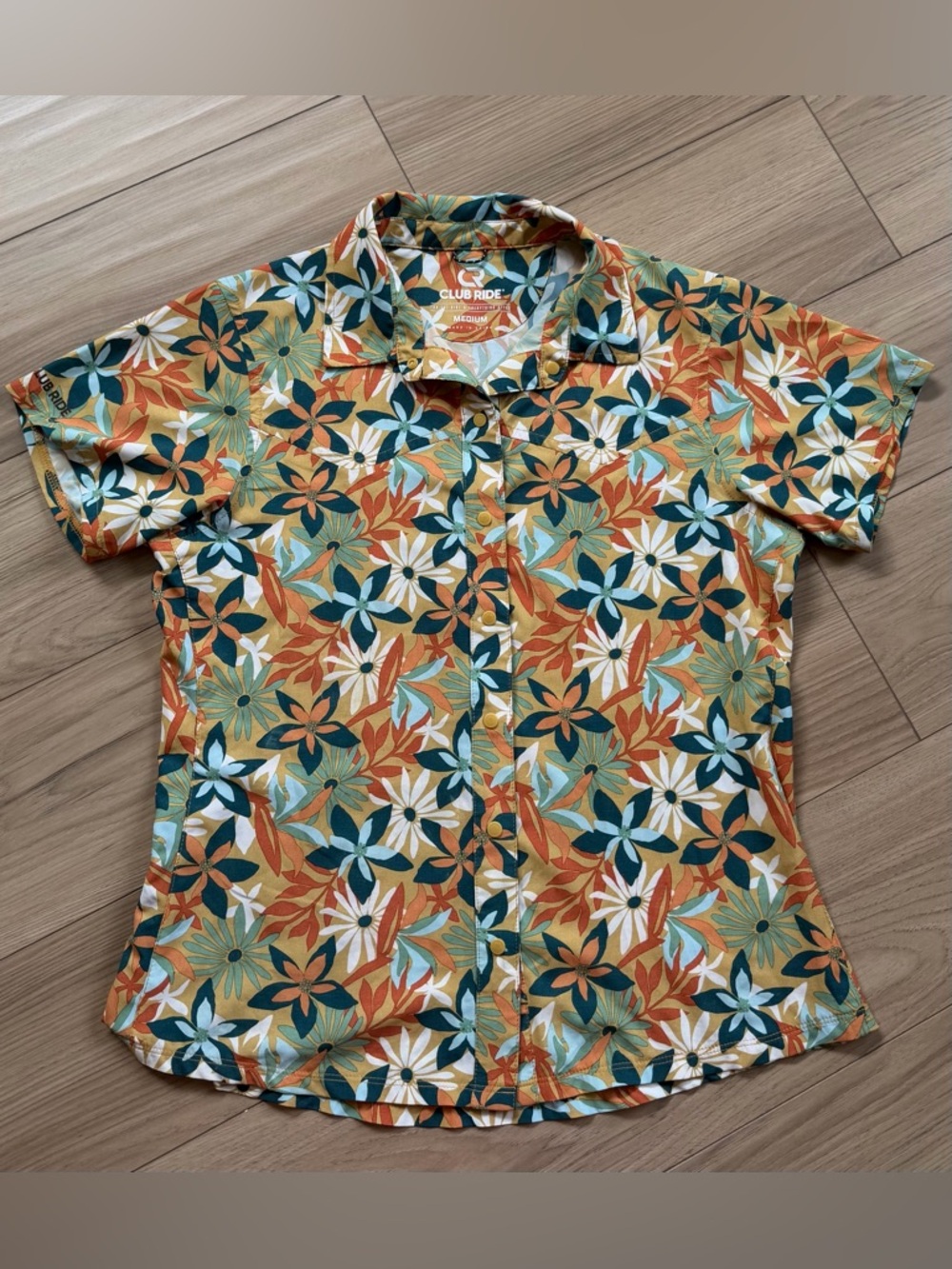 Club Ride Bandara Trailhead Party Floral Cycling Shirt in Teal, Orange & Cream